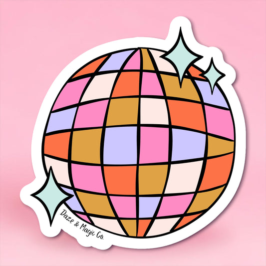 Colorful geometric sphere with star accents on a pink background, featuring the brand 'Daze & Magic Co'.