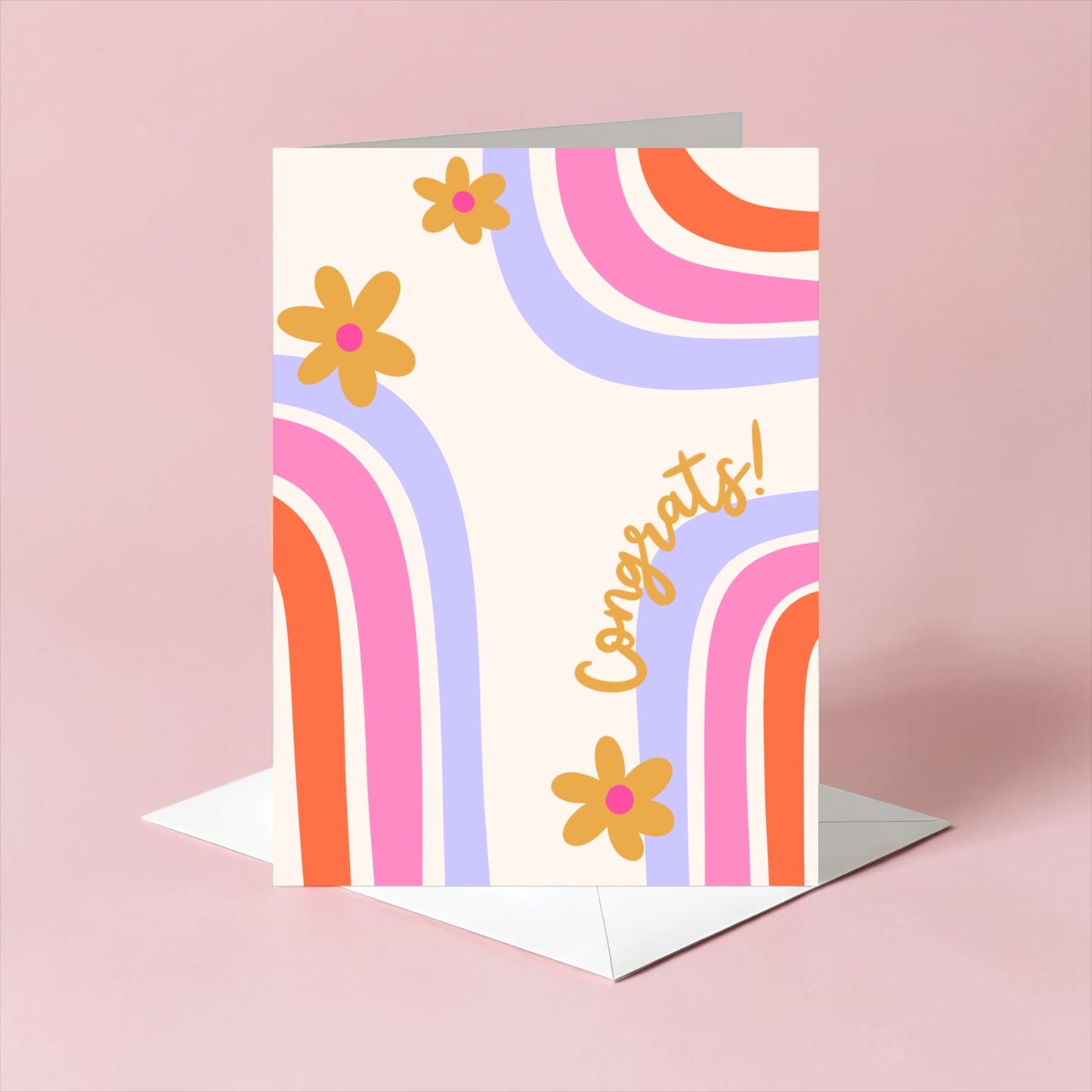 Greeting card with colorful rainbows and flowers on a pink background