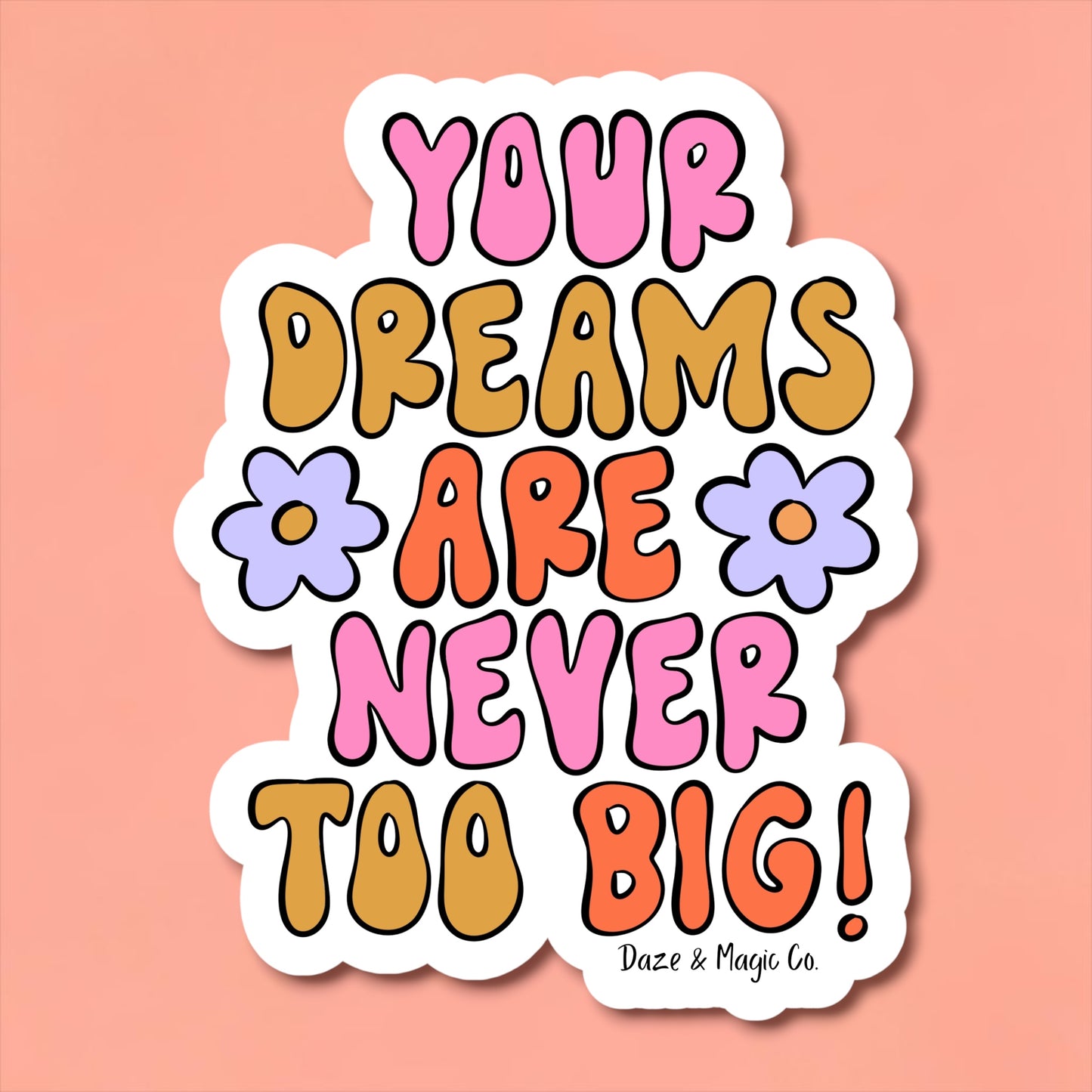 Sticker with colorful text 'Your dreams are never too big!' on a pink background